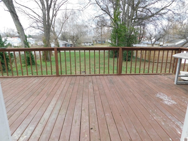 deck featuring a lawn