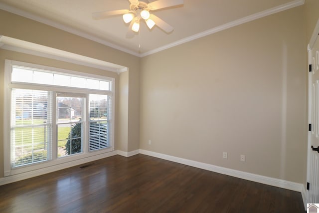 empty room featuring dark hardwood / wood-style floors, ceiling fan, and crown molding