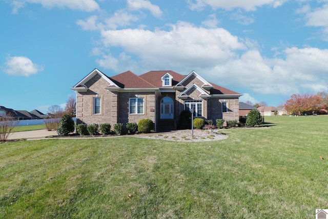 craftsman-style home with a front yard