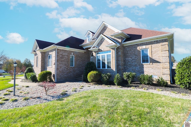 view of home's exterior with a lawn