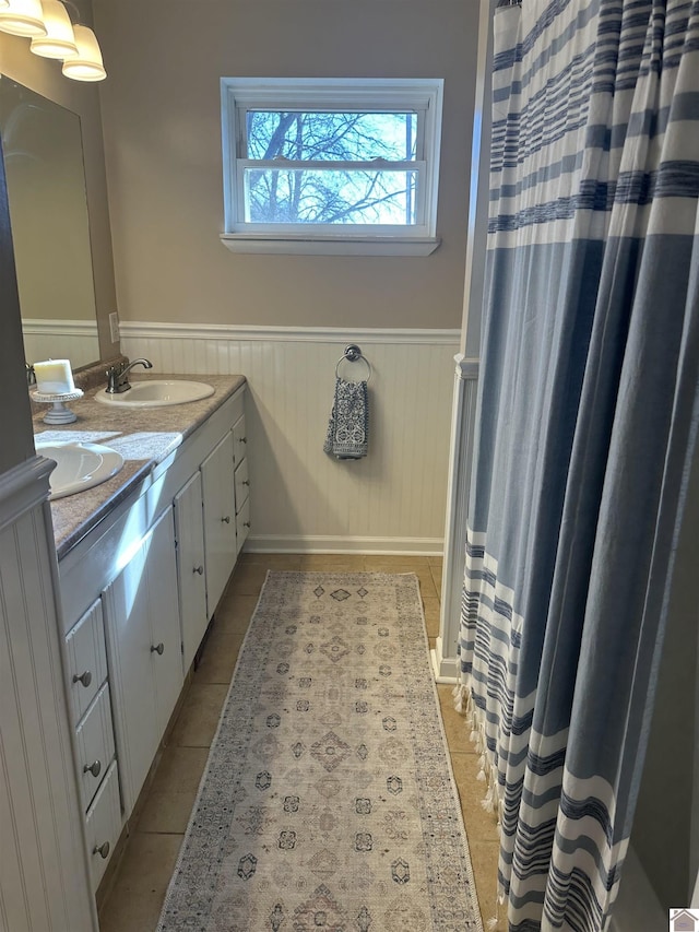 bathroom with vanity and tile patterned floors