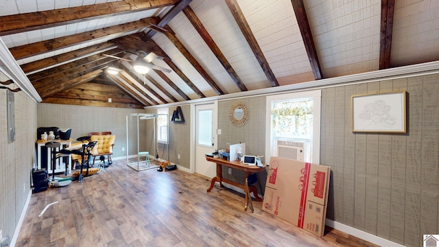 interior space featuring wood-type flooring, lofted ceiling with beams, cooling unit, and ceiling fan