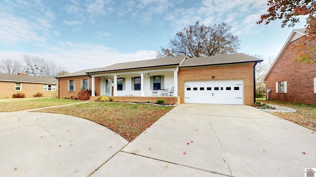 ranch-style home with a front lawn, a porch, and a garage