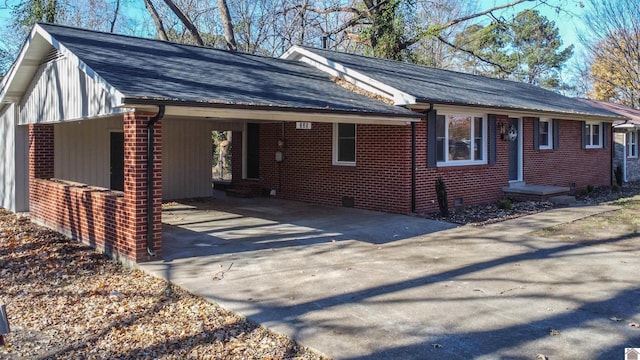 view of front of property with a carport