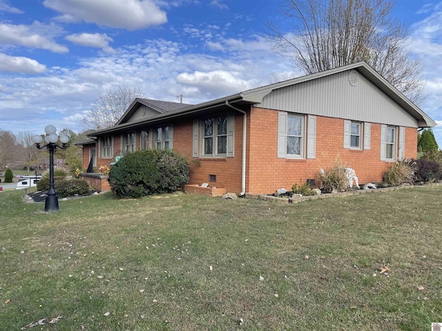 view of property exterior with a yard