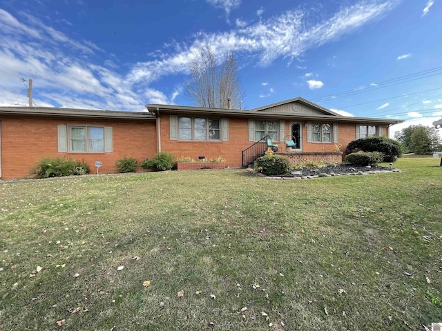 ranch-style house with a front yard