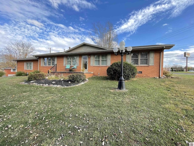 ranch-style house with a front yard