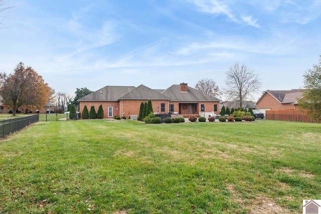 exterior space with a front lawn