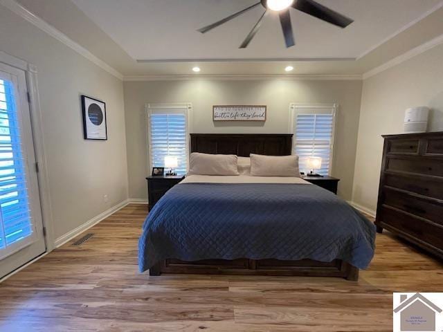 bedroom featuring access to outside, light hardwood / wood-style flooring, ceiling fan, and crown molding