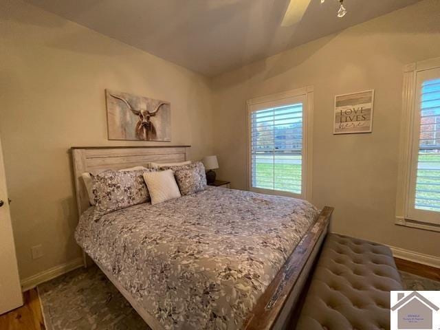 bedroom featuring hardwood / wood-style flooring and ceiling fan