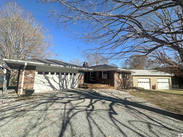 single story home featuring a garage