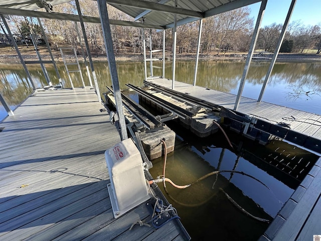 dock area with a water view