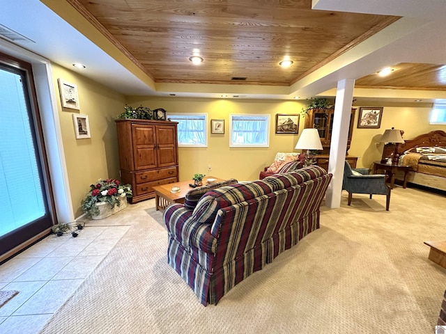 living room featuring a raised ceiling, light colored carpet, and wooden ceiling