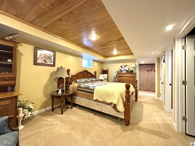 carpeted bedroom featuring a raised ceiling and wood ceiling