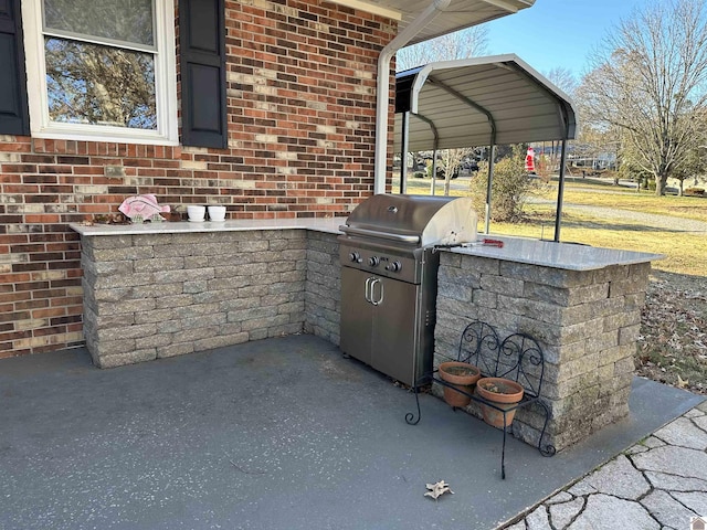 view of patio / terrace with exterior kitchen and grilling area