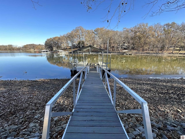 dock area featuring a water view