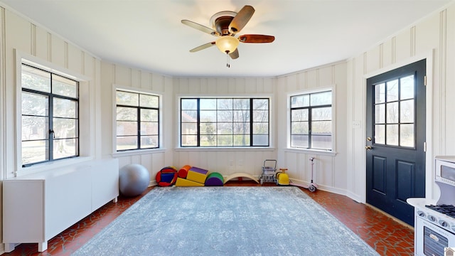 playroom featuring ceiling fan