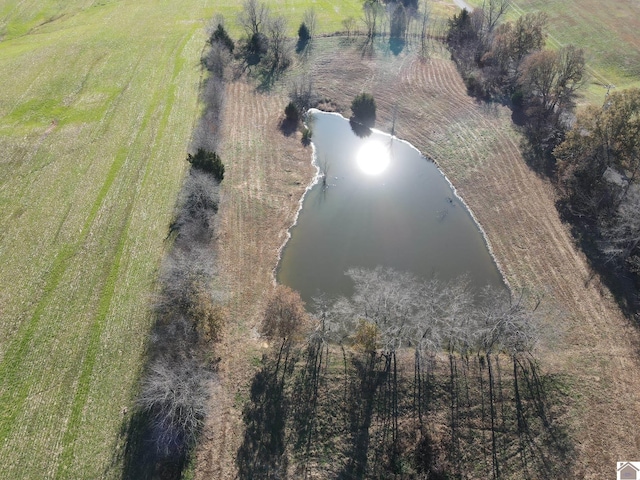 birds eye view of property with a rural view and a water view