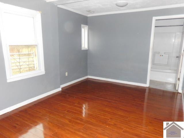 82 Ingleside Rd, Kevil, KY 42053 - spare room with crown molding and wood finished floors