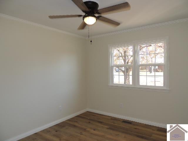 empty room with dark hardwood / wood-style floors, ceiling fan, and ornamental molding