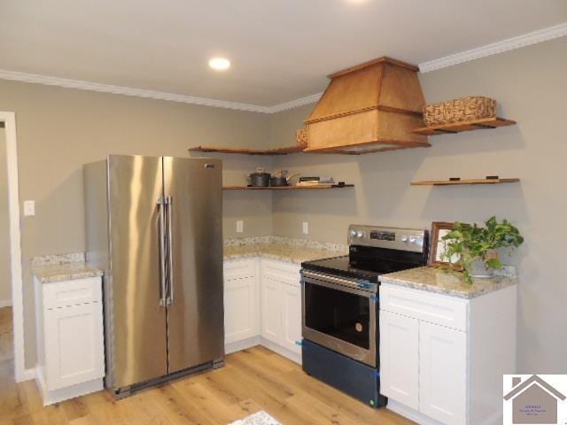 kitchen featuring white cabinetry, light hardwood / wood-style flooring, ornamental molding, and appliances with stainless steel finishes