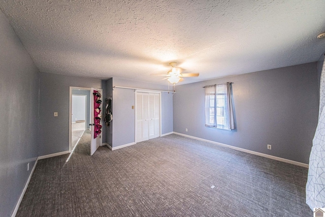 unfurnished bedroom with a textured ceiling and ceiling fan