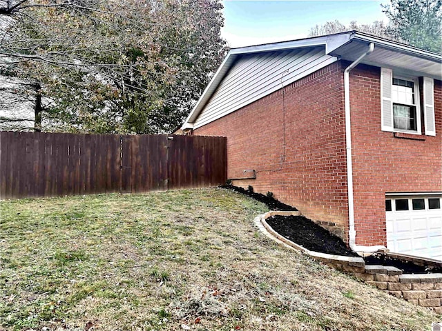 view of property exterior with a garage