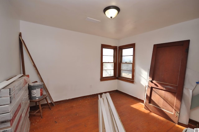 interior space with dark hardwood / wood-style floors