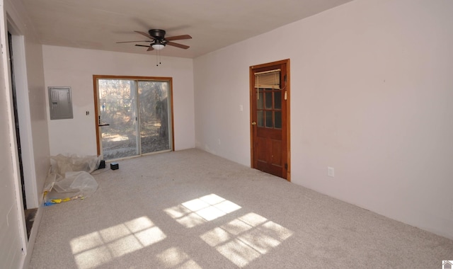 interior space featuring electric panel and ceiling fan