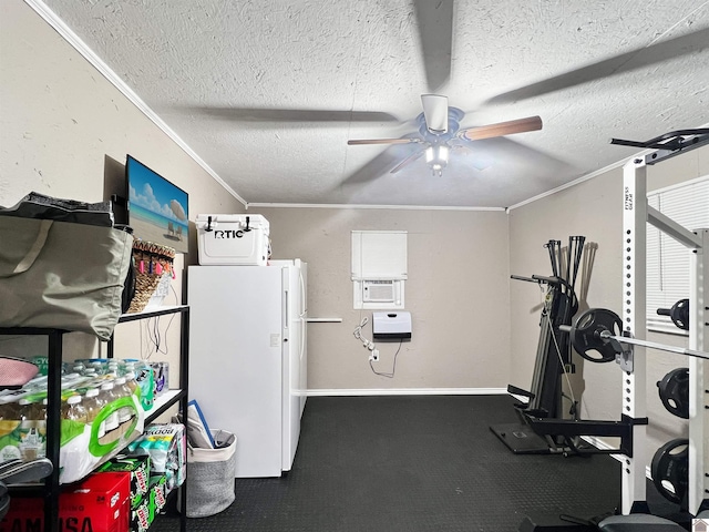 exercise room with carpet, ornamental molding, a textured ceiling, cooling unit, and ceiling fan