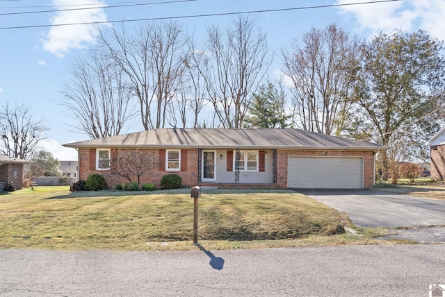 single story home with a front yard and a garage