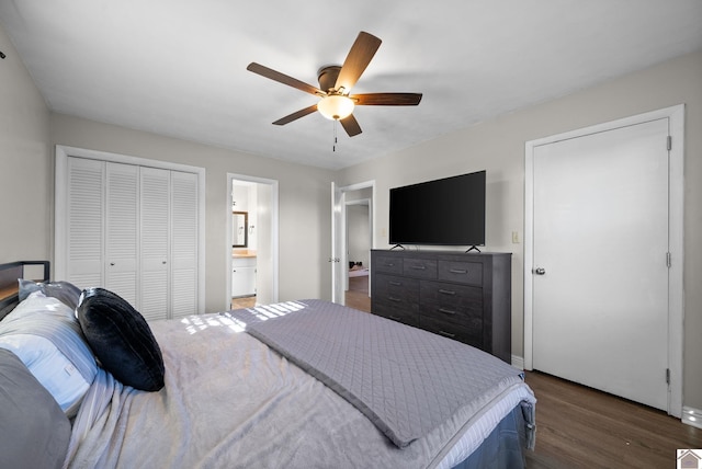 bedroom with dark hardwood / wood-style flooring, a closet, ceiling fan, and ensuite bathroom