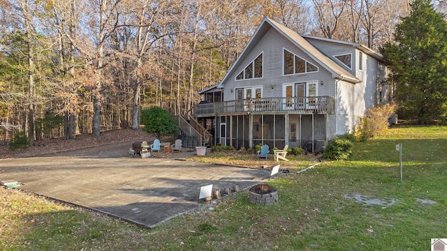 102 Persimmon Pl, Cadiz, KY 42211 - back of house featuring a deck, an outdoor fire pit, a lawn, and stairs