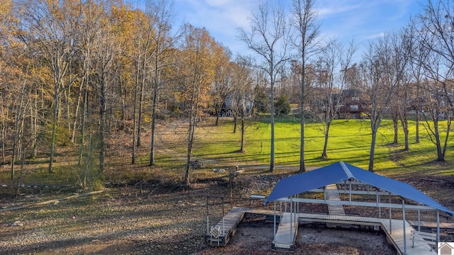 dock area featuring a lawn