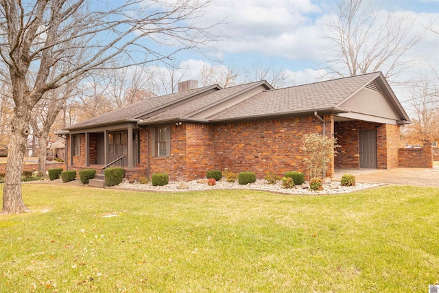 ranch-style home with a front lawn