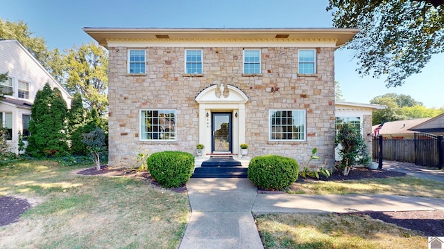 view of front of property with a front lawn