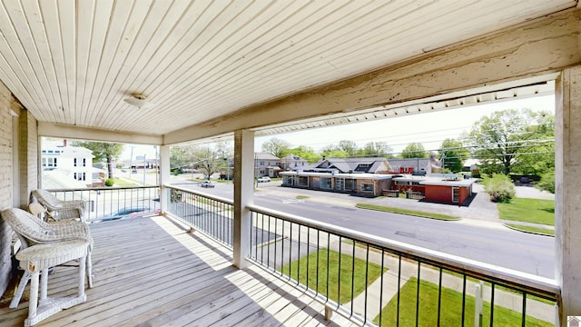 wooden terrace with covered porch