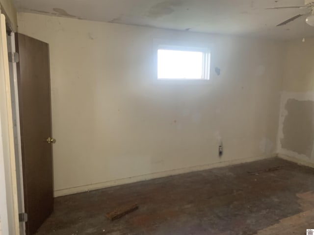 basement with ceiling fan