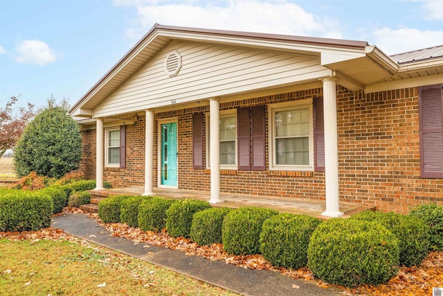 view of front of property featuring covered porch