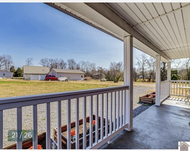 balcony featuring covered porch