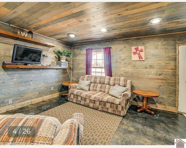 living room with concrete flooring, wooden walls, and wood ceiling