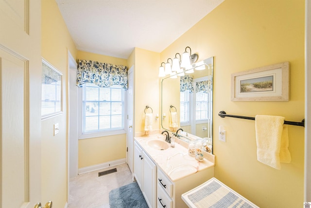 bathroom featuring vanity