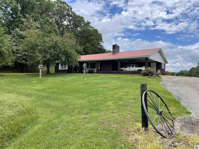 view of yard with a carport