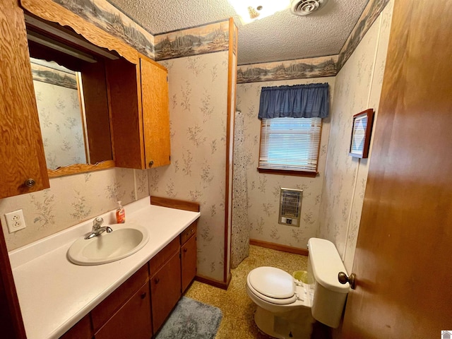3480 Radio Rd, Almo, KY 42020 - bathroom with vanity, toilet, a textured ceiling, and heating unit