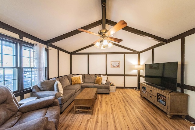 living room with lofted ceiling with beams, light hardwood / wood-style floors, and ceiling fan