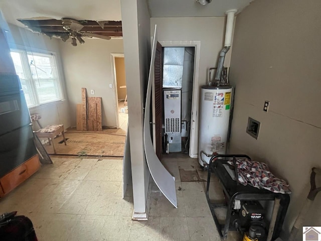 utility room featuring gas water heater