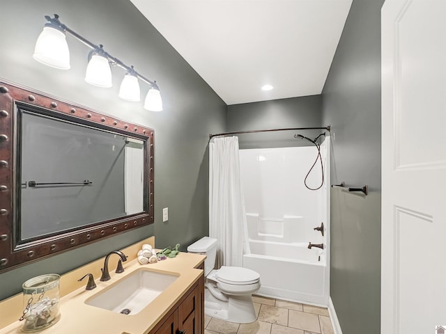 full bathroom with tile patterned flooring, shower / bath combo with shower curtain, vanity, and toilet