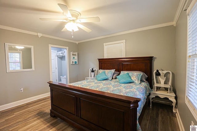 bedroom with hardwood / wood-style flooring, ceiling fan, a spacious closet, and crown molding