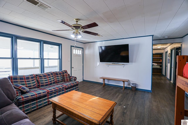 living room featuring dark hardwood / wood-style flooring and ceiling fan