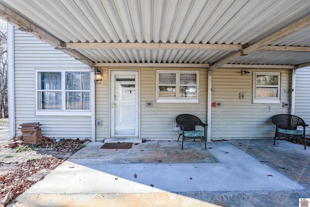 doorway to property featuring a patio area